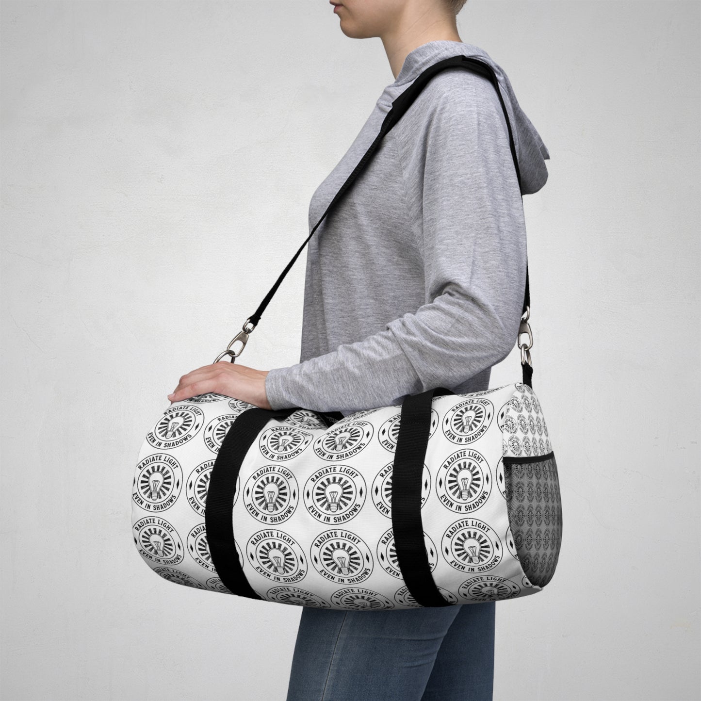 Stylish Duffel Bag with Emblem Design - Perfect for Travel and Gym