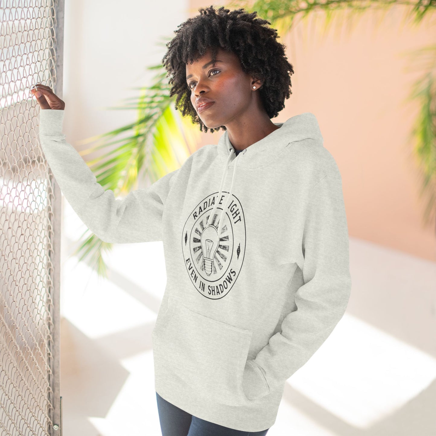 Radiate Light Fleece Hoodie - Inspirational Design for Comfort and Style